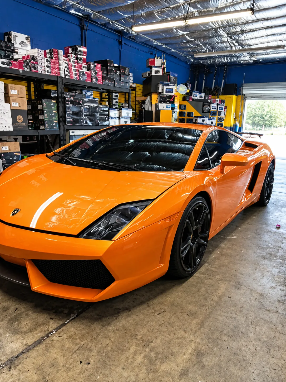 Orange Lamborghini Gallardo with tinted windows