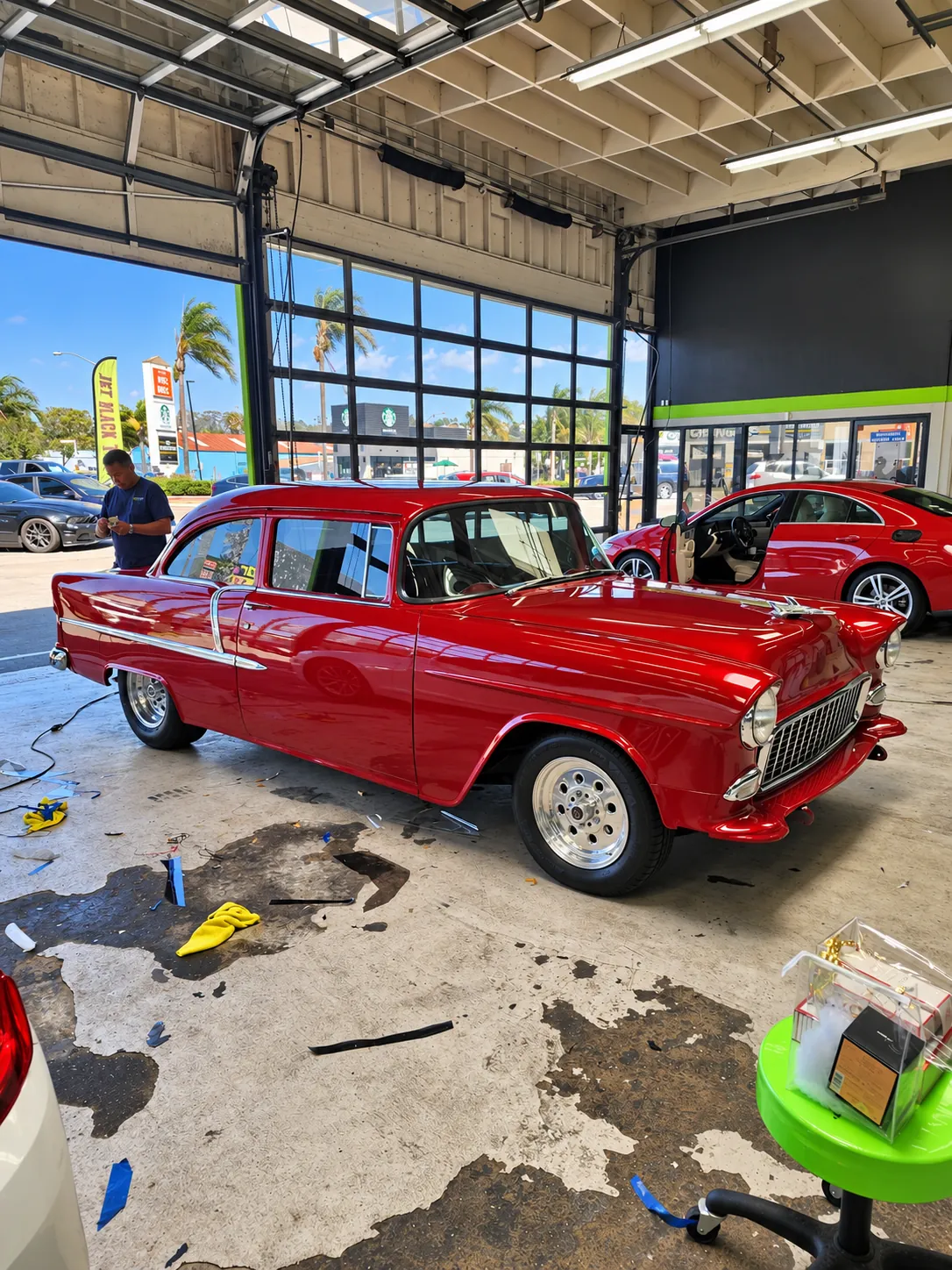 Classic red 1955 Chevy with a fresh gloss finish